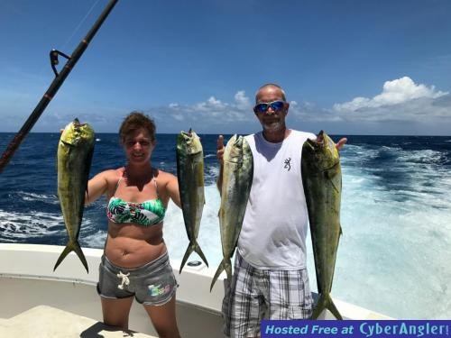 Chaylene_with_a_nice_catch_of_dolphin_fishing_with_New_Lattitude_Sportfishi