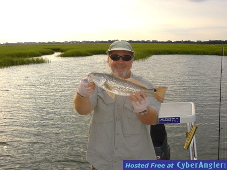 Capt_Rick_with_a_Topwater_Red