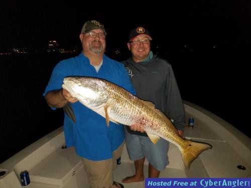 Huge_redfish_caught_with_Capt_Jared_on_a_night_fishing_charter_out_of_clear