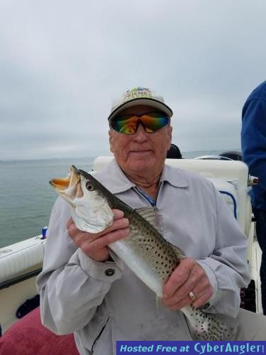 Joe_with_a_nice_trout_caught_on_a_Dunedin_Fishing_Charter