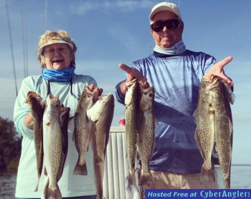 John_and_Margie_with_a_Tarpon_Spring_vaction_fish_and_Golf_Innisbrook