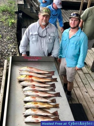 Redfish_and_Trout_in_the_Delacroix_Marshes___1