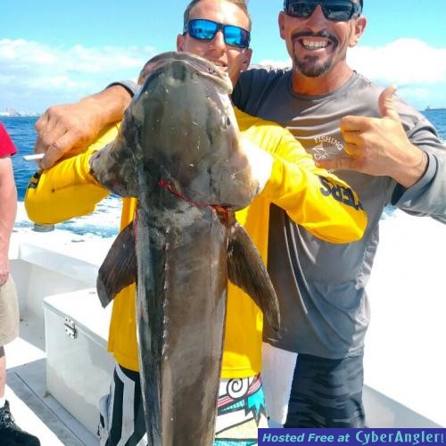Andrew_and_Mick_with_a_big_cobia_caught_on_the_New_Lattitude