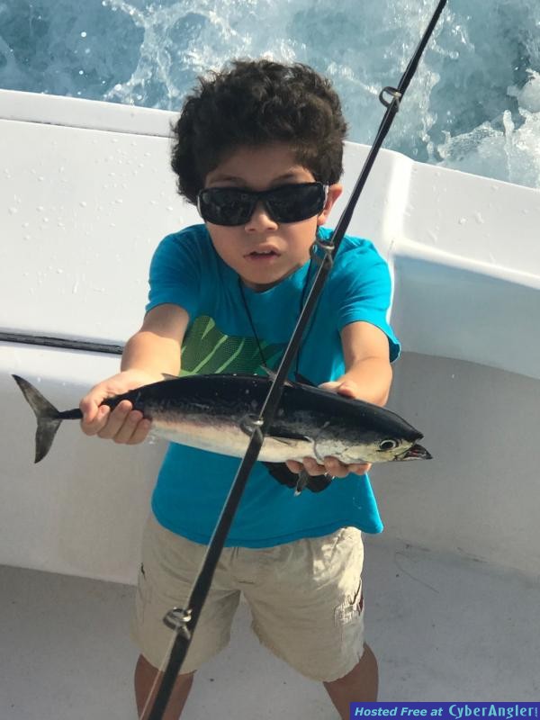 May31_other_boy_holding_fish
