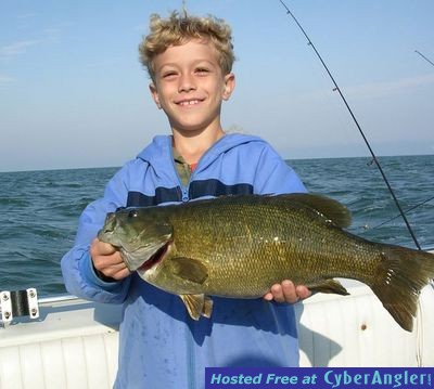 Carter is proud of his trophy smallmouth bass caught on Lake Erie