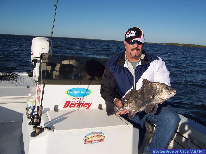 My brother Pete Porcelli hold up a twelve pound Black Drum
