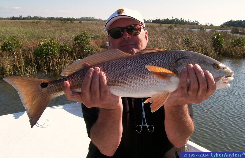 Mark Best with a Spoon fed Redfish