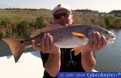 Mark Best with a Spoon fed Redfish
