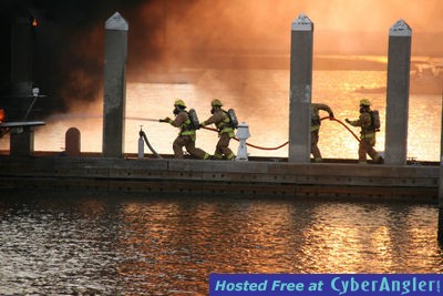 Firemen fight boat fire in Amelia Island