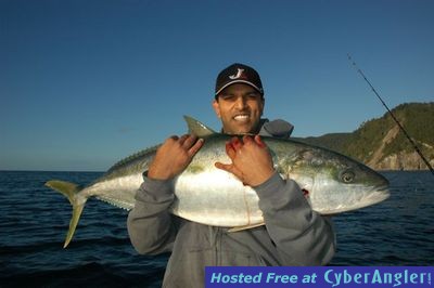 Anesh with a fat shallow water kingfish caught livebaiting